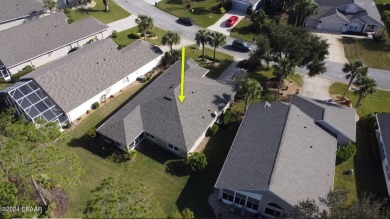 Welcome to your next haven with a scenic backyard view of the on Plantation Bay Golf and Country Club in Florida - for sale on GolfHomes.com, golf home, golf lot