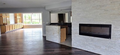 Spacious and versatile, this 4-bedroom, 3-bath home with a on Golf Hammock Country Club in Florida - for sale on GolfHomes.com, golf home, golf lot