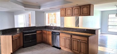 Spacious and versatile, this 4-bedroom, 3-bath home with a on Golf Hammock Country Club in Florida - for sale on GolfHomes.com, golf home, golf lot