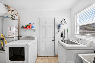 Welcome to 6137 Greenmeadow Rd, a delightful 3-bedroom home on Heartwell Golf Course in California - for sale on GolfHomes.com, golf home, golf lot