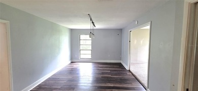 Spacious and versatile, this 4-bedroom, 3-bath home with a on Golf Hammock Country Club in Florida - for sale on GolfHomes.com, golf home, golf lot