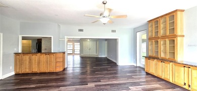 Spacious and versatile, this 4-bedroom, 3-bath home with a on Golf Hammock Country Club in Florida - for sale on GolfHomes.com, golf home, golf lot