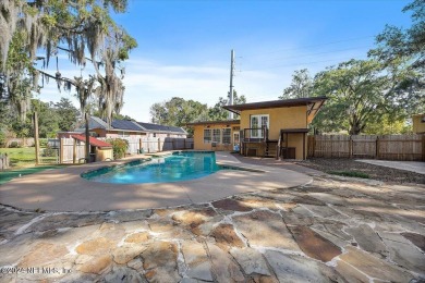 Riverviews and a sparkling pool Everyday on this huge 1/2 acre on Hyde Park Golf Club in Florida - for sale on GolfHomes.com, golf home, golf lot