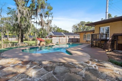 Riverviews and a sparkling pool Everyday on this huge 1/2 acre on Hyde Park Golf Club in Florida - for sale on GolfHomes.com, golf home, golf lot