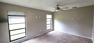 Spacious and versatile, this 4-bedroom, 3-bath home with a on Golf Hammock Country Club in Florida - for sale on GolfHomes.com, golf home, golf lot