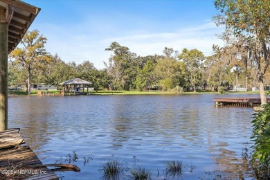 Riverviews and a sparkling pool Everyday on this huge 1/2 acre on Hyde Park Golf Club in Florida - for sale on GolfHomes.com, golf home, golf lot