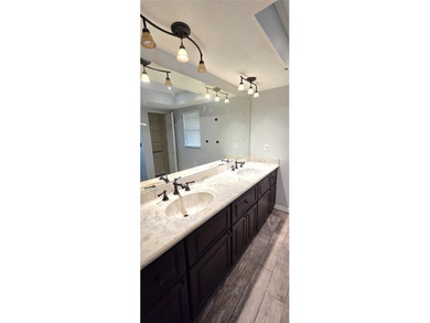 Spacious and versatile, this 4-bedroom, 3-bath home with a on Golf Hammock Country Club in Florida - for sale on GolfHomes.com, golf home, golf lot