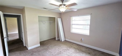 Spacious and versatile, this 4-bedroom, 3-bath home with a on Golf Hammock Country Club in Florida - for sale on GolfHomes.com, golf home, golf lot