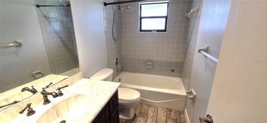 Spacious and versatile, this 4-bedroom, 3-bath home with a on Golf Hammock Country Club in Florida - for sale on GolfHomes.com, golf home, golf lot