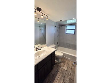 Spacious and versatile, this 4-bedroom, 3-bath home with a on Golf Hammock Country Club in Florida - for sale on GolfHomes.com, golf home, golf lot