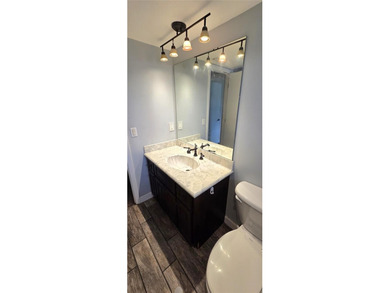 Spacious and versatile, this 4-bedroom, 3-bath home with a on Golf Hammock Country Club in Florida - for sale on GolfHomes.com, golf home, golf lot