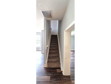 Spacious and versatile, this 4-bedroom, 3-bath home with a on Golf Hammock Country Club in Florida - for sale on GolfHomes.com, golf home, golf lot