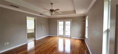 Spacious and versatile, this 4-bedroom, 3-bath home with a on Golf Hammock Country Club in Florida - for sale on GolfHomes.com, golf home, golf lot