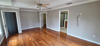 Spacious and versatile, this 4-bedroom, 3-bath home with a on Golf Hammock Country Club in Florida - for sale on GolfHomes.com, golf home, golf lot