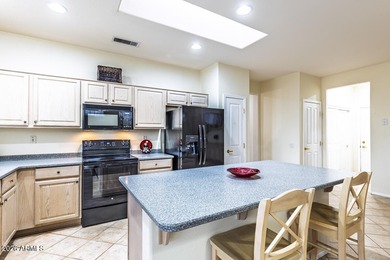 Fantastic Verbena model has a large eat-in kitchen with loads of on Granite Falls Golf Club  in Arizona - for sale on GolfHomes.com, golf home, golf lot