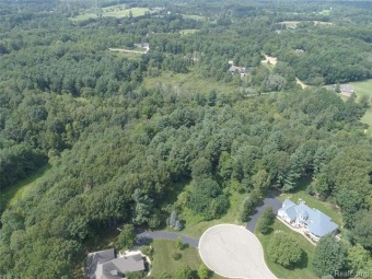 NOW IS THE TIME to purchase this highly desirable piece of on Heather Hills Golf Course in Michigan - for sale on GolfHomes.com, golf home, golf lot