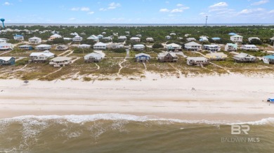 Start your morning with a coffee on the porch swing while you on Kiva Dunes Golf Club in Alabama - for sale on GolfHomes.com, golf home, golf lot
