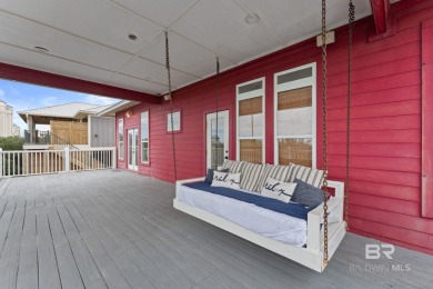 Start your morning with a coffee on the porch swing while you on Kiva Dunes Golf Club in Alabama - for sale on GolfHomes.com, golf home, golf lot