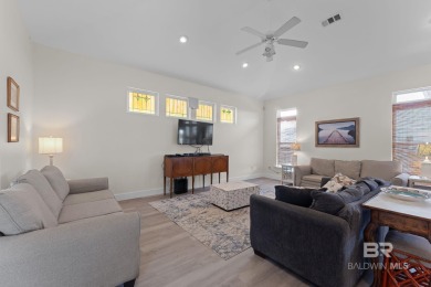 Start your morning with a coffee on the porch swing while you on Kiva Dunes Golf Club in Alabama - for sale on GolfHomes.com, golf home, golf lot