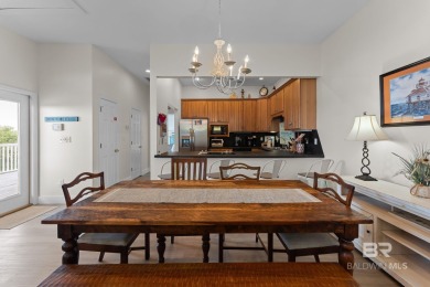 Start your morning with a coffee on the porch swing while you on Kiva Dunes Golf Club in Alabama - for sale on GolfHomes.com, golf home, golf lot