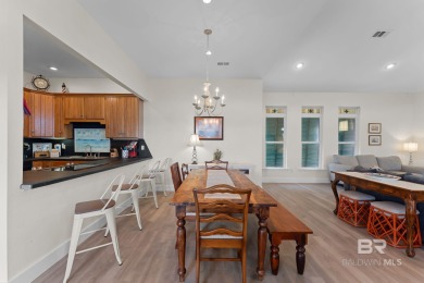 Start your morning with a coffee on the porch swing while you on Kiva Dunes Golf Club in Alabama - for sale on GolfHomes.com, golf home, golf lot
