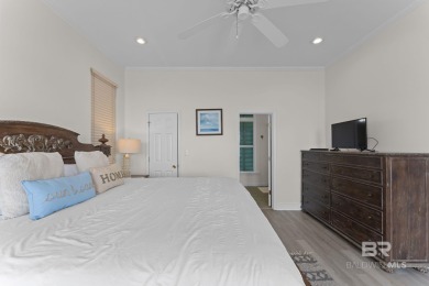 Start your morning with a coffee on the porch swing while you on Kiva Dunes Golf Club in Alabama - for sale on GolfHomes.com, golf home, golf lot