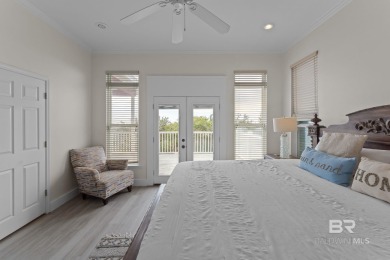 Start your morning with a coffee on the porch swing while you on Kiva Dunes Golf Club in Alabama - for sale on GolfHomes.com, golf home, golf lot