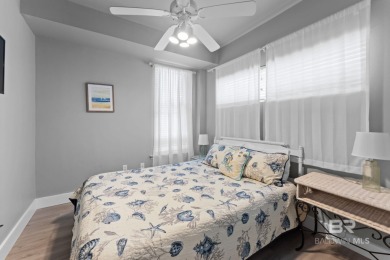 Start your morning with a coffee on the porch swing while you on Kiva Dunes Golf Club in Alabama - for sale on GolfHomes.com, golf home, golf lot