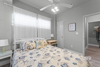 Start your morning with a coffee on the porch swing while you on Kiva Dunes Golf Club in Alabama - for sale on GolfHomes.com, golf home, golf lot
