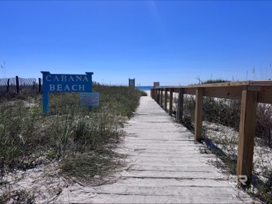 Start your morning with a coffee on the porch swing while you on Kiva Dunes Golf Club in Alabama - for sale on GolfHomes.com, golf home, golf lot