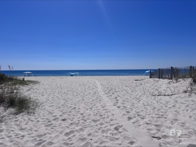 Start your morning with a coffee on the porch swing while you on Kiva Dunes Golf Club in Alabama - for sale on GolfHomes.com, golf home, golf lot