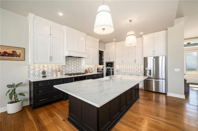 Step into luxury with the sought-after Madison II Reverse by Don on Staley Farms Golf Club in Missouri - for sale on GolfHomes.com, golf home, golf lot
