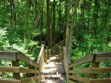 Welcome to a showpiece of design and craftsmanship -- a on Spruce Creek Golf Club in Florida - for sale on GolfHomes.com, golf home, golf lot