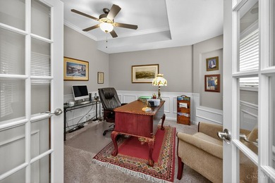 Step into a meticulous first-floor end unit with stunning Shaker on Shaker Run Golf Club  in Ohio - for sale on GolfHomes.com, golf home, golf lot