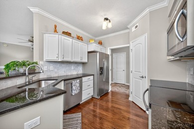 Step into a meticulous first-floor end unit with stunning Shaker on Shaker Run Golf Club  in Ohio - for sale on GolfHomes.com, golf home, golf lot