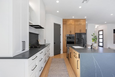 This like-new home has it all--10' ceilings, hardwood floors on Bloomington Country Club in Utah - for sale on GolfHomes.com, golf home, golf lot
