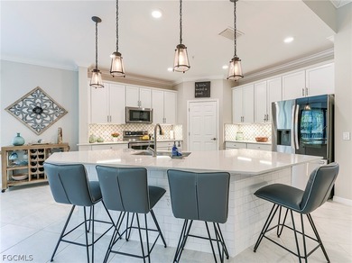 This rare second-floor carriage home in the Casella neighborhood on Pelican Preserve Golf Club in Florida - for sale on GolfHomes.com, golf home, golf lot