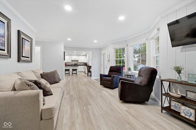 Discover this completely remodeled lakefront gem on Morse on Harbour Trees Golf Club in Indiana - for sale on GolfHomes.com, golf home, golf lot