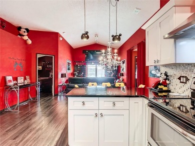 Turnkey 3 Bed, 2 Bath Mickey Mouse-Themed Pool Home in Ridgewood on Ridgewood Lakes Golf and Country Club in Florida - for sale on GolfHomes.com, golf home, golf lot