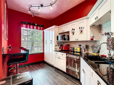 Turnkey 3 Bed, 2 Bath Mickey Mouse-Themed Pool Home in Ridgewood on Ridgewood Lakes Golf and Country Club in Florida - for sale on GolfHomes.com, golf home, golf lot