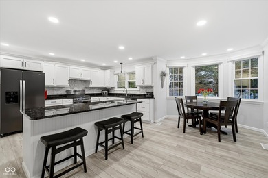 Discover this completely remodeled lakefront gem on Morse on Harbour Trees Golf Club in Indiana - for sale on GolfHomes.com, golf home, golf lot