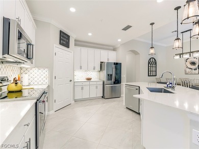 This rare second-floor carriage home in the Casella neighborhood on Pelican Preserve Golf Club in Florida - for sale on GolfHomes.com, golf home, golf lot