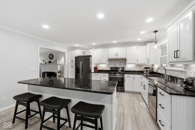 Discover this completely remodeled lakefront gem on Morse on Harbour Trees Golf Club in Indiana - for sale on GolfHomes.com, golf home, golf lot