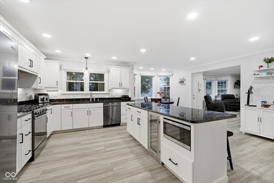 Discover this completely remodeled lakefront gem on Morse on Harbour Trees Golf Club in Indiana - for sale on GolfHomes.com, golf home, golf lot