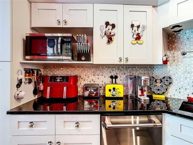 Turnkey 3 Bed, 2 Bath Mickey Mouse-Themed Pool Home in Ridgewood on Ridgewood Lakes Golf and Country Club in Florida - for sale on GolfHomes.com, golf home, golf lot
