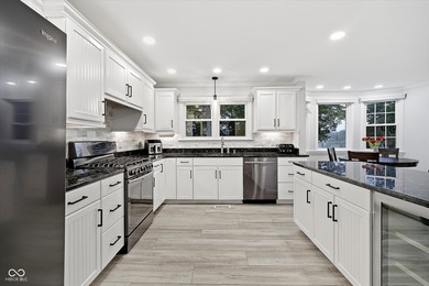 Discover this completely remodeled lakefront gem on Morse on Harbour Trees Golf Club in Indiana - for sale on GolfHomes.com, golf home, golf lot