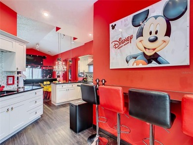 Turnkey 3 Bed, 2 Bath Mickey Mouse-Themed Pool Home in Ridgewood on Ridgewood Lakes Golf and Country Club in Florida - for sale on GolfHomes.com, golf home, golf lot