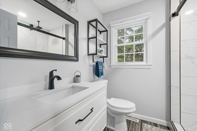 Discover this completely remodeled lakefront gem on Morse on Harbour Trees Golf Club in Indiana - for sale on GolfHomes.com, golf home, golf lot