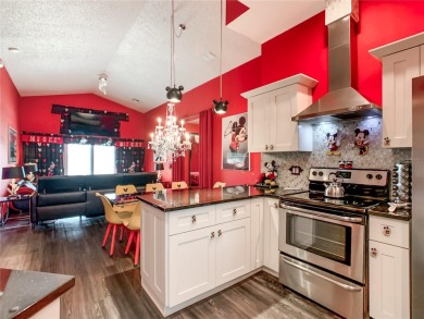 Turnkey 3 Bed, 2 Bath Mickey Mouse-Themed Pool Home in Ridgewood on Ridgewood Lakes Golf and Country Club in Florida - for sale on GolfHomes.com, golf home, golf lot