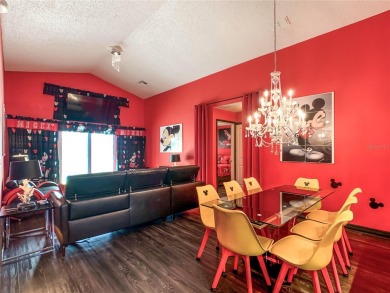 Turnkey 3 Bed, 2 Bath Mickey Mouse-Themed Pool Home in Ridgewood on Ridgewood Lakes Golf and Country Club in Florida - for sale on GolfHomes.com, golf home, golf lot